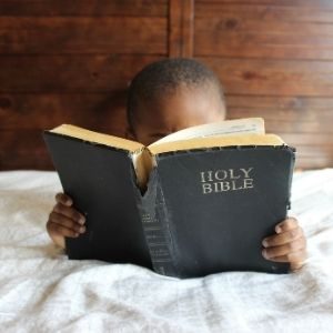 Encouraging Bible Verses for Homeschool Families Child with Bible
