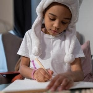Girl working on copywork