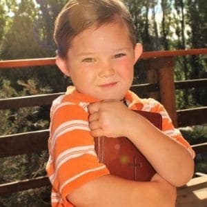 Child with preschool Bible