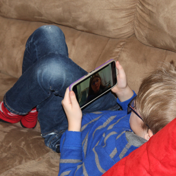child watching Dr. Robin's school videos to learn about the human body