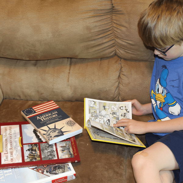 child studying history with Sonlight literature based history curriculum