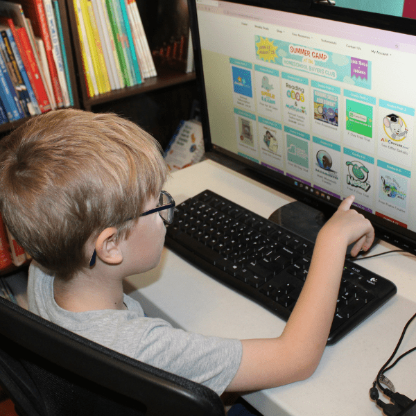 child exploring free summer homeschool curriculum options from Homeschool Buyers Club