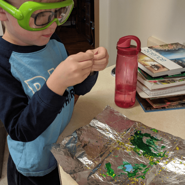student learning about the rock cycle with Berean Builders Elementary Science in History hands on science curriculum