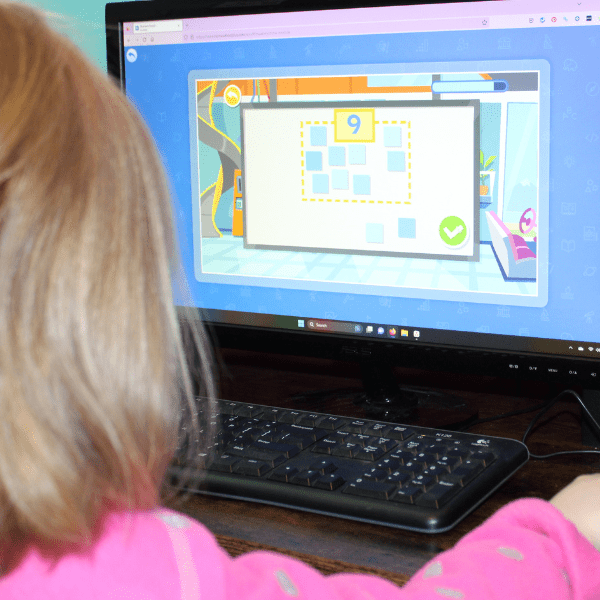 kindergartener practicing math and counting