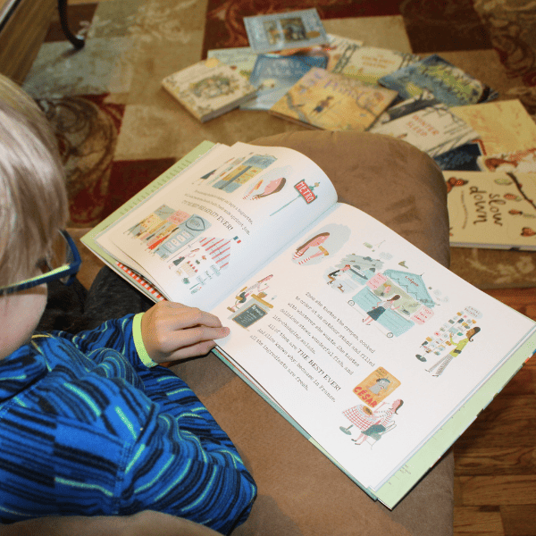 student reading about nature