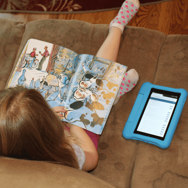 child reading with literature based homeschool curriculum
