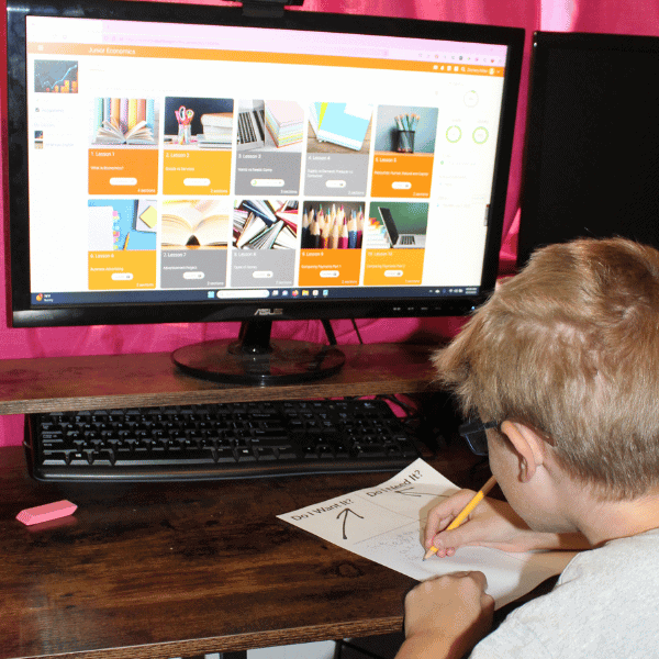 child learning with Mr. D Math Homeschool Economics Curriculum