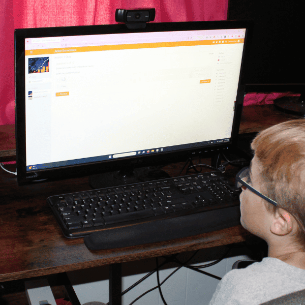 child learning with Mr. D Math Homeschool Economics Curriculum